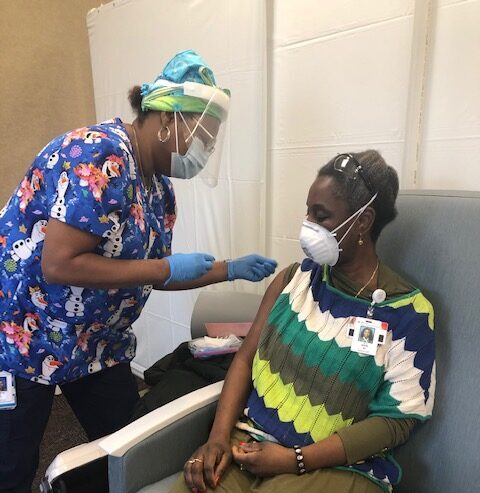 Dr. Akin gets her covid vaccine at Good D+Samaritan hospital