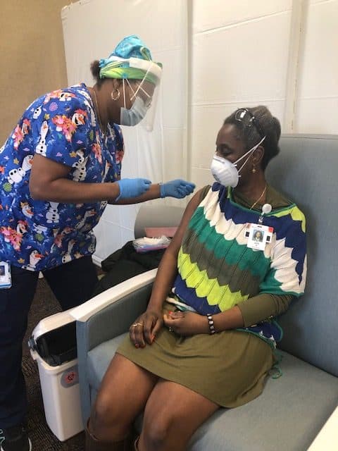 Dr. Akin gets her covid vaccine at Good D+Samaritan hospital